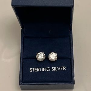 Sterling cubic zirconia diamond stud earrings.